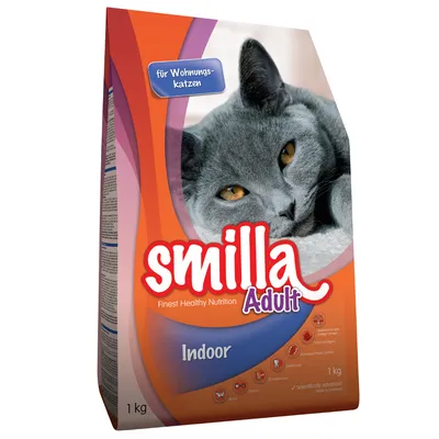 Smilla Adult Indoor kattenvoer, 1 kg verpakking. Tekst: 'für Wohnungskatzen', 'Finest Healthy Nutrition', 'Scientifically advanced', 'Made in Germany'. Afbeelding van een grijze kat.