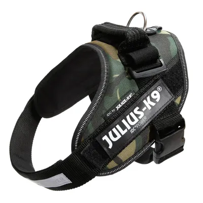 Hundesele med tekst JULIUS-K9 IDC POWER og IDC by JULIUS-K9, synlig spænde, metalring og camouflage-mønster. Materiale: stof og plastik.