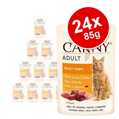 animonda Carny Adult Rind + Huhn cat food, 24 x 85g pouches. Visible text: 100% frische Zutaten, Ohne Getreide, Made in Germany. Image shows orange tabby cat and meat pieces.