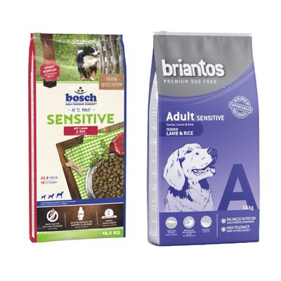 Två hundfoderförpackningar: bosch Sensitive mit Lamm & Reis 15,0 kg och briantos Adult Sensitive Lamb & Rice 14 kg. Båda visar produktnamn och vikt tydligt på framsidan.