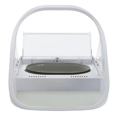 Automatic feeder with white housing and grey food tray, suitable for precise portion control.