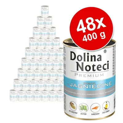 Dolina Noteci Premium v jagnięcině, balení 48×400 g. Na etiketě: rýž brązowy, bazylia, marchew, olej lniany. Konzervy zobrazené ve tvaru pyramidy.