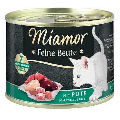 Miamor Feine Beute, med kalkun, kornfri. Syv slags kød og indmad. Billede af råt kød og hvid kat på dåsen.