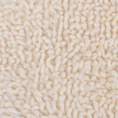 Gros plan sur une surface en tissu beige à texture chenille, matière douce et épaisse, sans autres éléments visibles.