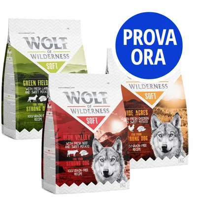 Tre confezioni di crocchette Wolf of Wilderness Soft da 1 kg: Green Fields, High Valley e Wide Acres. Testo visibile: 'PROVA ORA' su cerchio blu.