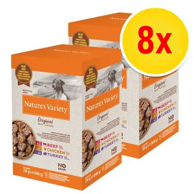 Nature's Variety Original våtfoder för hund, 8-pack. Synliga smaker: nötkött, kyckling, kalkon. Text: NO GRAIN. Förpackningsbild med skål och hundfoto.