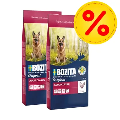 Två påsar Bozita Original Adult Classic hundfoder 12 kg med bild på schäfer, synlig kycklingsymbol och röd procent-symbol för rabatt i hörnet. Två påsar Bozita Original Adult Classic hundfoder 12 kg med bild på schäfer, synlig kycklingsymbol och röd procent-symbol för rabatt i hörnet.