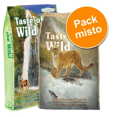 Duas embalagens de Taste of the Wild, texto visível: 'Rocky Mountain Feline Roasted Venison', 'Canyon River Feline Formula with Trout & Smoked Salmon'. Selo laranja: 'Pack misto'. Duas embalagens de Taste of the Wild, texto visível: 'Rocky Mountain Feline Roasted Venison', 'Canyon River Feline Formula with Trout & Smoked Salmon'. Selo laranja: 'Pack misto'.
