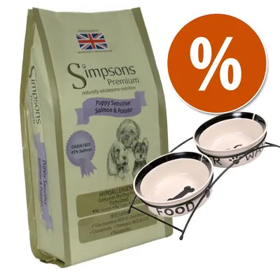 Simpsons Premium Puppy Sensitive Salmon & Potato, sacco di crocchette per cuccioli, ciotole in ceramica con supporto e simbolo percentuale per offerta.