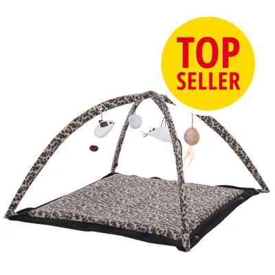 Alfombra de juego con estampado de leopardo y arco, incluye juguetes colgantes en forma de ratón y bola. Círculo amarillo con texto: TOP SELLER.