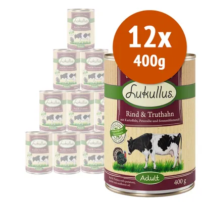 12 lattine da 400 g Lukullus Rind & Truthahn Adult, visibili su etichetta: manzo e tacchino con patate, prezzemolo e olio di girasole. Testo grande: 12x 400g.