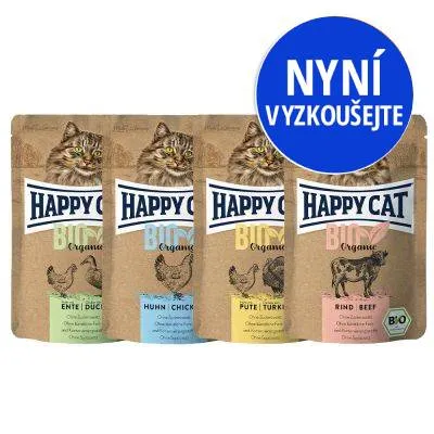 Happy Cat BIO Organic Ente, Huhn, Pute, Rind. Čtyři sáčky s obrázky koček a zvířat. Modrý kruh s textem: NYNÍ VYZKOUŠEJTE. B/O označení na obalu. Happy Cat BIO Organic Ente, Huhn, Pute, Rind. Čtyři sáčky s obrázky koček a zvířat. Modrý kruh s textem: NYNÍ VYZKOUŠEJTE. B/O označení na obalu.
