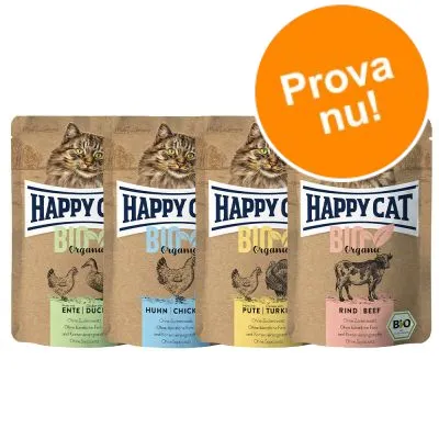 Fyra förpackningar Happy Cat Bio Organic kattmat: Ente, Huhn, Pute, Rind. Stor orange cirkel med texten 'Prova nu!'.