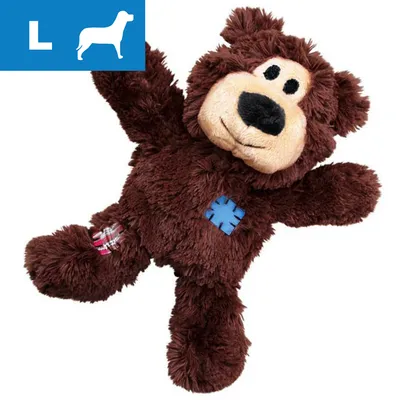 Brown plush bear toy with stitched patches, shown with a blue label indicating size L and a dog silhouette in the corner. Brown plush bear toy with stitched patches, shown with a blue label indicating size L and a dog silhouette in the corner.