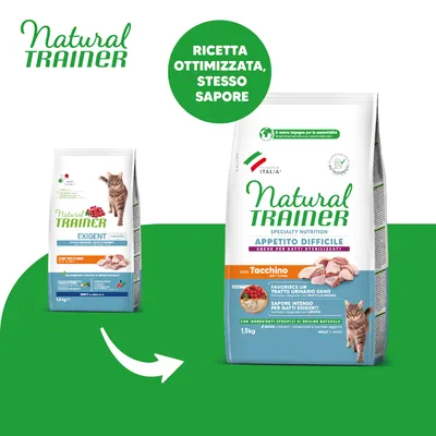 Due confezioni di crocchette Natural Trainer per gatti, testo visibile: 'Ricetta ottimizzata, stesso sapore', 'Appetito difficile con Tacchino', peso 1,5 kg, immagini di tacchino e gatto.