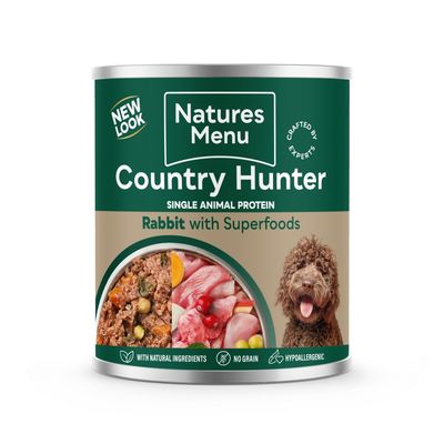 Natures Menu Country Hunter single animal protein, rabbit with superfoods. With natural ingredients, no grain, hypoallergenic. Images of food mix, raw meat, and a curly-haired dog.
