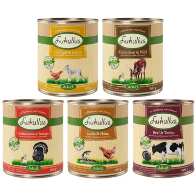 Conserve Lukullus Adult 800 g: Geflügel & Lamm, Kaninchen & Wild, Wildkaninchen & Truthahn, Lachs & Huhn, Beef & Turkey. Etichete vizibile cu ingrediente și animale ilustrate.