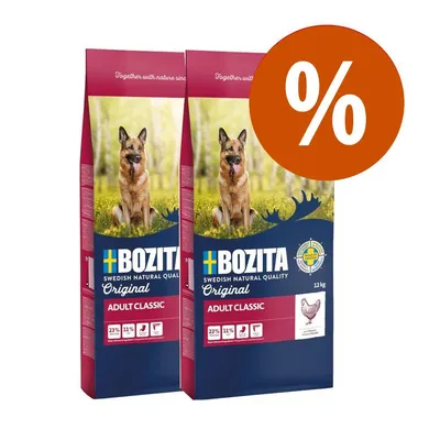 Két Bozita Adult Classic kutyatáp 12 kg-os csomag, elöl nagy százalékjel látható. Csomagon: 23% fehérje, 11% zsír, csirke ikon, svéd zászló, felnőtt kutya képe.
