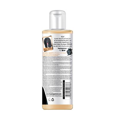 Back label of oatmeal shampoo bottle showing ingredients, usage instructions, social media icons, and website address. Includes a photo of a dog and product description text.
