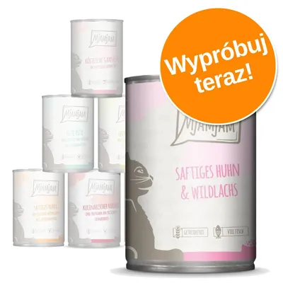 Zestaw puszek MjAMjAM, na pierwszym planie Saftiges Huhn & Wildlachs. Pomarańczowe koło z napisem: Wypróbuj teraz!