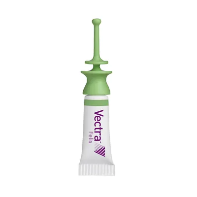 Pipeta con aplicador verde y texto visible: Vectra Felis. El envase es blanco con detalles en verde y morado.