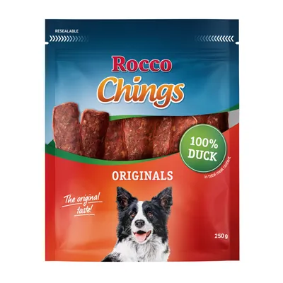 Opakowanie Rocco Chings Originals 250 g, widoczne paski mięsa, napis 100% Duck, The original taste!, ilustracja psa na dole opakowania.