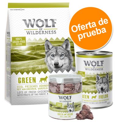 Wolf of Wilderness Green, oferta de prueba. Paquete y latas con texto 100% grain-free recipe, lots of fresh chicken with fruits of the forest, roots and wild herbs.