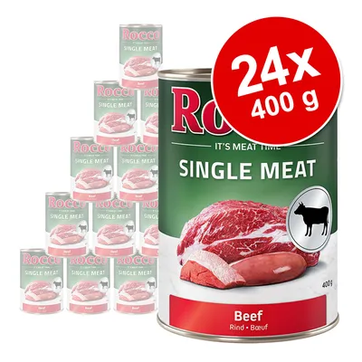 Set 24 conserve Rocco Single Meat Beef, 400 g fiecare. Etichetă cu imagine carne de vită, text vizibil: 'Rocco', 'Single Meat', 'Beef', simbol vacă neagră. Set 24 conserve Rocco Single Meat Beef, 400 g fiecare. Etichetă cu imagine carne de vită, text vizibil: 'Rocco', 'Single Meat', 'Beef', simbol vacă neagră.