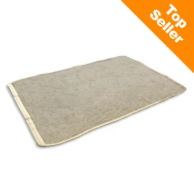 Rektangulær beige måtte med tekstur. Synlig orange hjørne med teksten “Top Seller”.