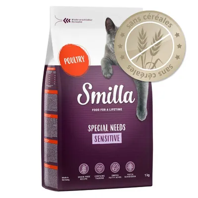 Smilla Special Needs Sensitive, volaille, 1 kg, sans céréales, mentions visibles : grain-free recipe, contains taurine, omega fatty acids, yucca schidigera. Chat visible sur l’emballage.
