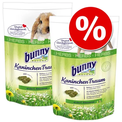 Zwei Packungen bunny KaninchenTraum Kräuterfutter mit Aufschrift 'Unsere Glücksformel', BioDivers, ab dem 6. Lebensmonat, rotes Prozentzeichen für Rabattaktion.