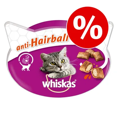 Envase de Whiskas anti-Hairball con imagen de gato gris, croquetas rellenas y símbolo de oferta en rojo con porcentaje. Texto visible: whiskas, anti-Hairball.
