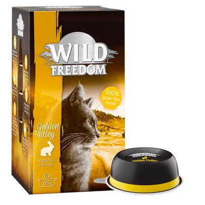 Συσκευασία Wild Freedom Golden Valley Rabbit & Chicken, 6x85g. Εμφανίζεται γάτα, ένδειξη 100% grain-free recipe και λαγός. Μπροστά φαίνεται ένα ατομικό δοχείο τροφής.