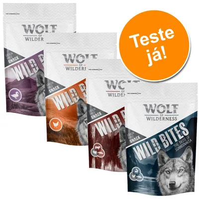 Quatro embalagens de snacks Wolf of Wilderness Wild Bites, com texto visível: 'Grain Free Snack', 'The Taste of Scandinavia' e círculo laranja com 'Teste já!'.