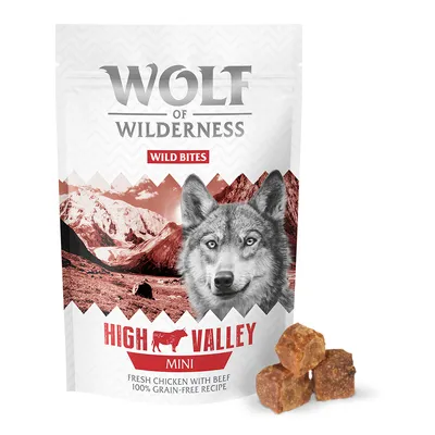 Sachet Wolf of Wilderness Wild Bites High Valley Mini, Fresh Chicken with Beef, 100% grain-free recipe, avec trois bouchées carrées visibles devant l’emballage.