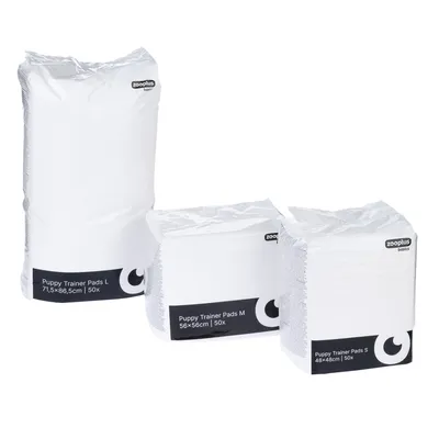 zooplus basics Puppy Trainer Pads S 48×48 cm, M 56×56 cm, L 71,5×86,5 cm, chaque paquet contient 50 pièces, emballages visibles côte à côte