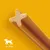 Chew stick with cross-section shape, suitable for animals weighing 10 to 25 kg as indicated by icon and weight range in the image.