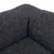 Close-up of a dark grey, textured fabric cover with visible seams.