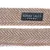 Nomad Tales lettering on brown and white fabric with herringbone pattern.