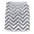 Grey and white chevron pattern on a folded fabric surface.