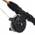 Close-up of a black fishing reel with handle and copper rod, suitable for fishing accessories.