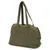 Sac de transport en tissu vert avec deux longues anses, poche avant et fermeture zippée. Étiquette visible : 'Trixie Friends on Tour'.