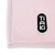 Tiaki logo on pink fabric material.