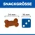 Snackgrösse: Hundeknochenförmiger Snack mit 24 mm Länge, Vergleich mit Würfel von 16 mm Grösse.