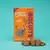 Edgard Cooper Bravo Biscuits hondenkoekjes met kip, 130 stuks. Tekst op verpakking: Crunch Crunch, no added sugar, yes really, 1.7 carbon foodprint.
