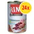 Lata de comida Rinti Kennerfleisch con texto visible: 'Mit Geflügelherzen', 'NEU noch mehr natürliche Fleischstücke'. Paquete de 24 unidades destacado en círculo amarillo.