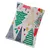 Coussin rectangulaire en tissu décoré de motifs sapins de Noël verts, rouges, dorés et bleus sur fond blanc. Aucun texte ou marque visible.