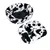 Round pet bed with removable cushion, black and white cow pattern, soft material.