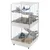 Grande cage à rongeurs en métal blanc avec plusieurs étages, rampes, tunnels transparents, hamac bleu et accessoires visibles, bac inférieur amovible et roulettes.