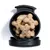Bone-shaped biscuits stored inside a round black container with the lid open, showing several treats stacked together.